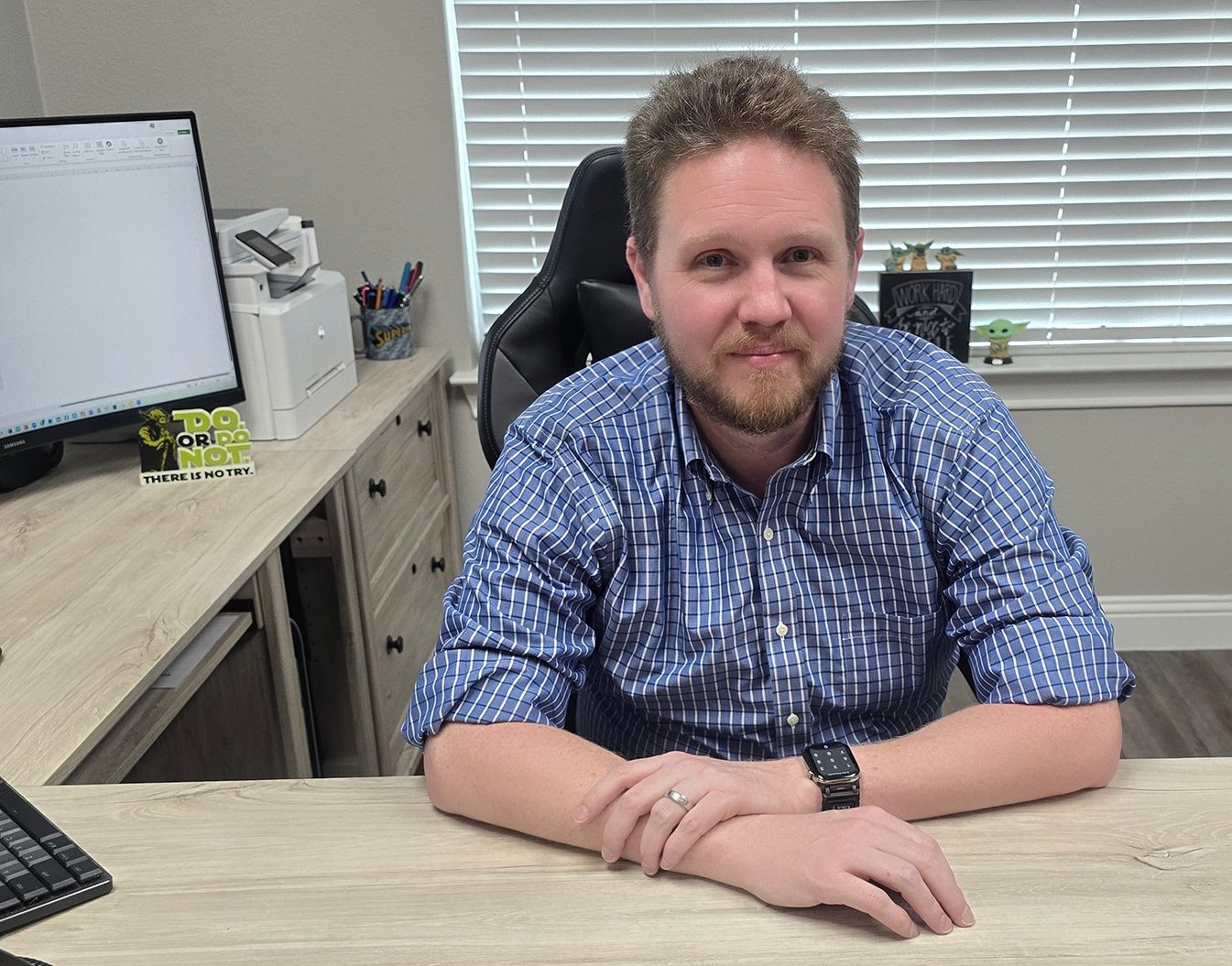 Ryan Otto at his desk